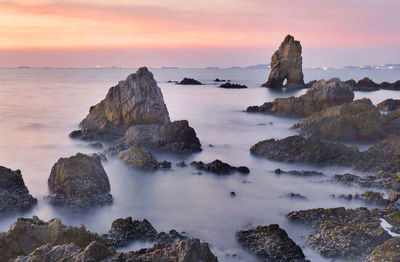 Scenic view of sea against sky during sunset