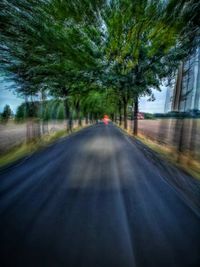 Road passing through trees