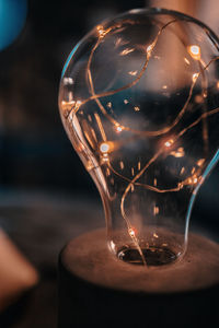 Close-up of illuminated light bulb