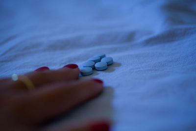 Close-up of hand on table