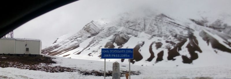 Scenic view of snow covered mountains