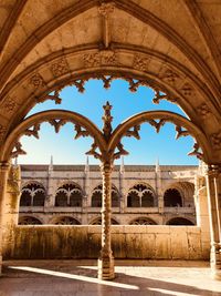 Archway of historical building against clear sky