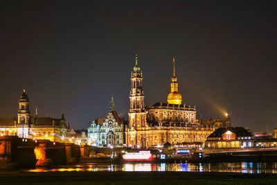 Illuminated cathedral against sky at night