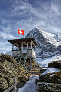 Lookout tower with the eiger north face in switzerland 