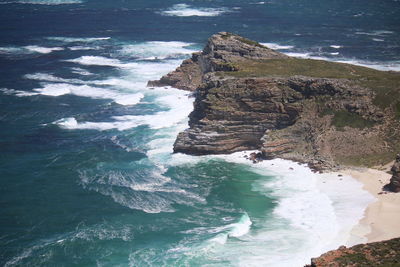 High angle view of rocks in sea