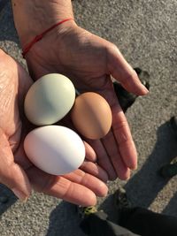 High angle view of hand holding ice cream