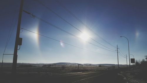 Scenic view of landscape against blue sky