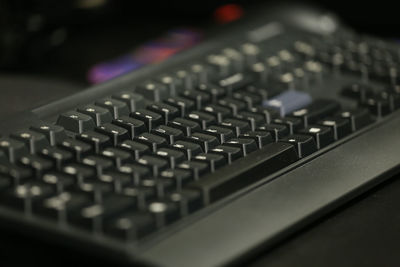 Close-up of computer keyboard on table