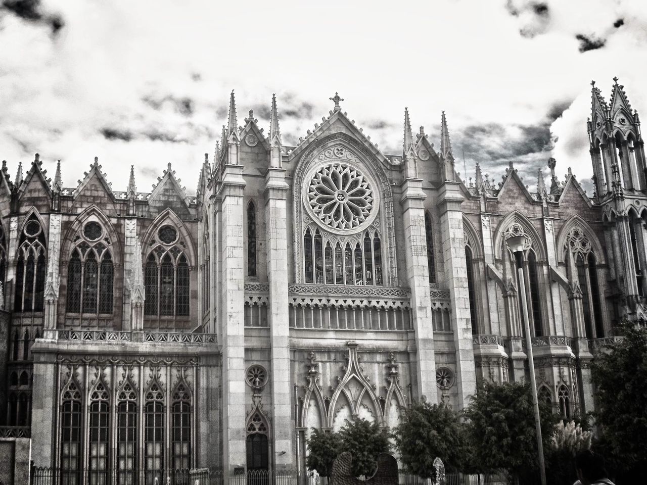 architecture, built structure, religion, place of worship, building exterior, spirituality, church, sky, low angle view, cathedral, facade, history, cloud - sky, dome, famous place, travel destinations, arch, ornate