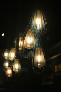 Low angle view of illuminated light bulb