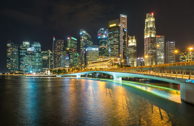 Marina bay sands, singapore - may 23 2017 singapore city skyline on the bridge at night.