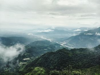 Aerial view of mountains against sky