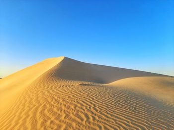 Dune in sunset on desert