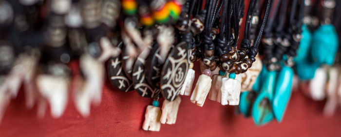 Close-up of necklaces at store