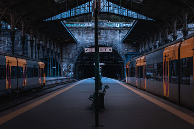 Blurred motion of train at railroad station