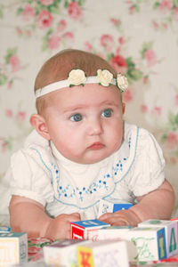 Portrait of cute baby boy at home