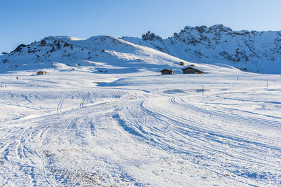 Scenic view of snow covered mountain against sky