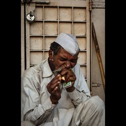 Man holding cigarette