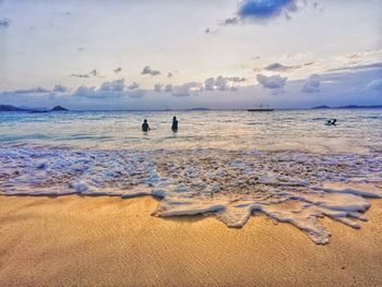 Scenic view of beach against sky