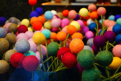 Close-up of multi colored candies for sale in market
