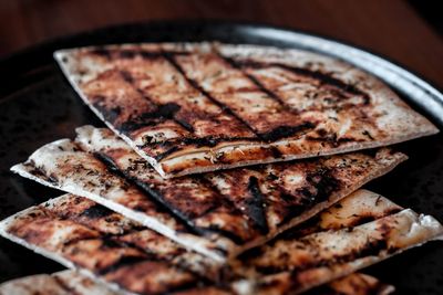 High angle view of meat on barbecue grill