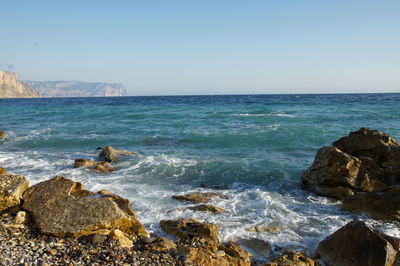 Scenic view of sea against clear sky
