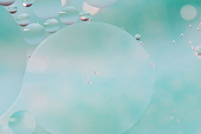 Low angle view of bubbles on swimming pool