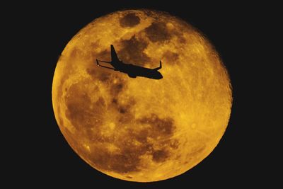 Scenic view of moon against sky at night