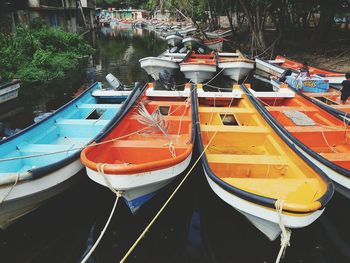 High angle view of boats moored at harbor