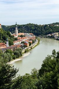 High angle view of river amidst buildings in city