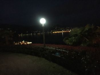 View of illuminated street light at night