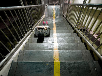 High angle view of woman on steps