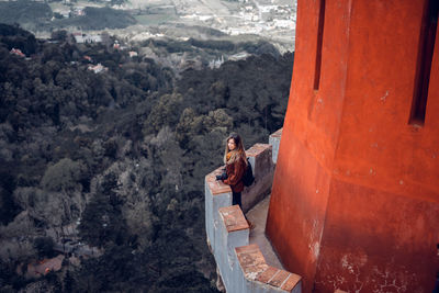 Woman standing on mountain