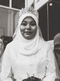 Portrait of smiling bride during wedding ceremony