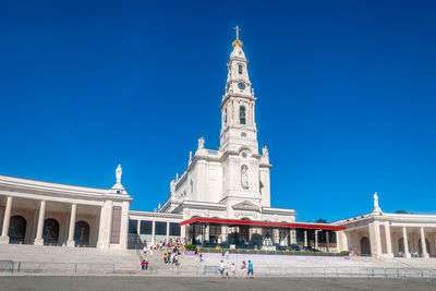 View of historical building against clear blue sky