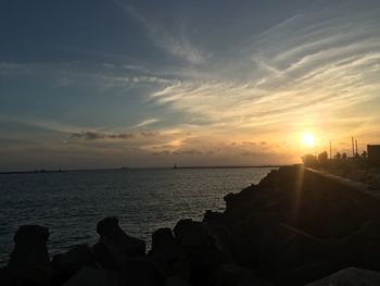 Scenic view of sea against sky during sunset