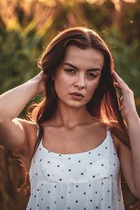 Portrait of young woman looking away