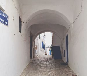 Narrow alley along buildings