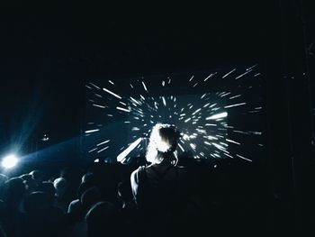 Firework display at night