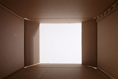 Open cardboard box against white background