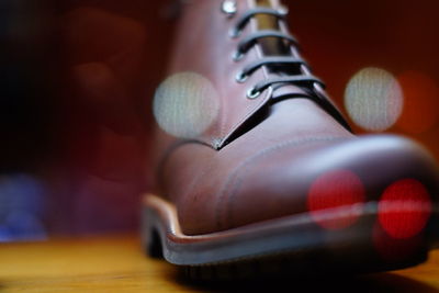 Close-up of shoes on table