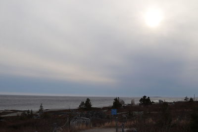 Scenic view of beach at sunset