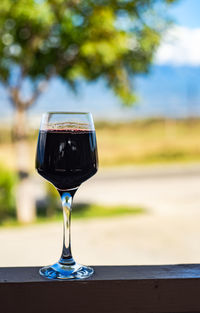 Close-up of wineglass on table