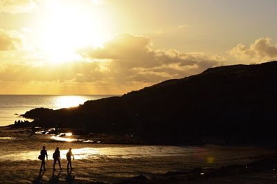 Scenic view of sea at sunset