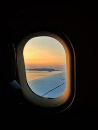 View of sea seen through airplane window