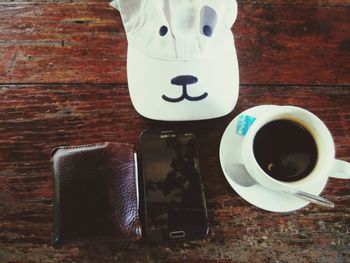 Close-up of coffee cup on table