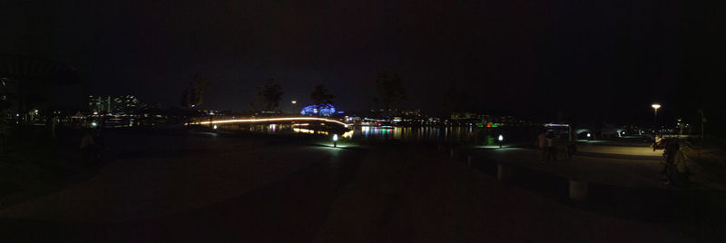 Bridge over river at night