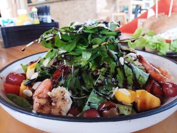 Close-up of chopped vegetables in plate on table