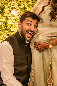 Portrait of smiling young couple