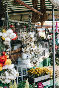 Flower pots for sale at market stall